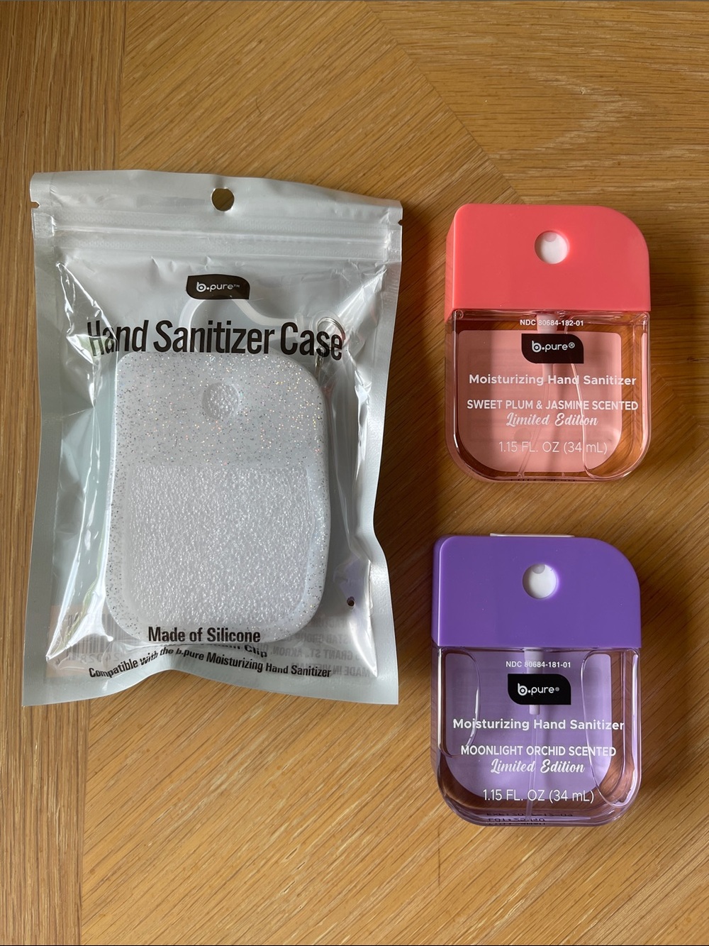 b-pure glitter Hand Sanitizer case with 2 limited edition hand sanitizers NWT